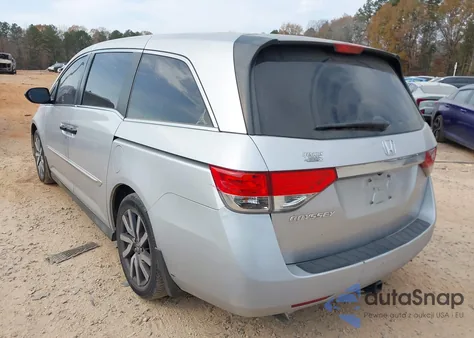 2014 Honda Odyssey Lx z USA, uszkodzony, nr VIN 5FNRL5H27EB033961